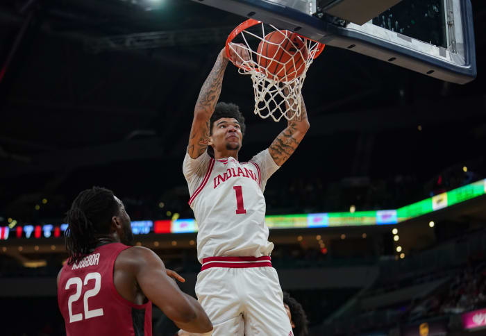 Indiana Hoosiers center Kel'el Ware (1) dunks the ball against Harvard Crimson forward Justice Ajogbor (22) during the game against Harvard in Gainbridge Fieldhouse.